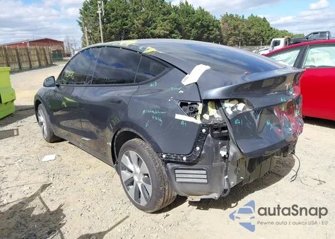 2023 Tesla Model Y Awd/Long Range Dual Motor All-Wheel Drive z USA, uszkodzony, nr VIN 7SAYGDEE3PF605171